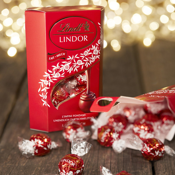"LINDT LINDOR" pieninio šokolado rutuliukai, 200g "LINDT LINDOR" pieninio šokolado rutuliukai, 200g